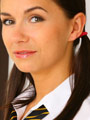 "Dark haired beauty wearing college uniform and pink underwear."
