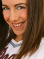"Stunning brunette in sexy cheerleading outfit. "